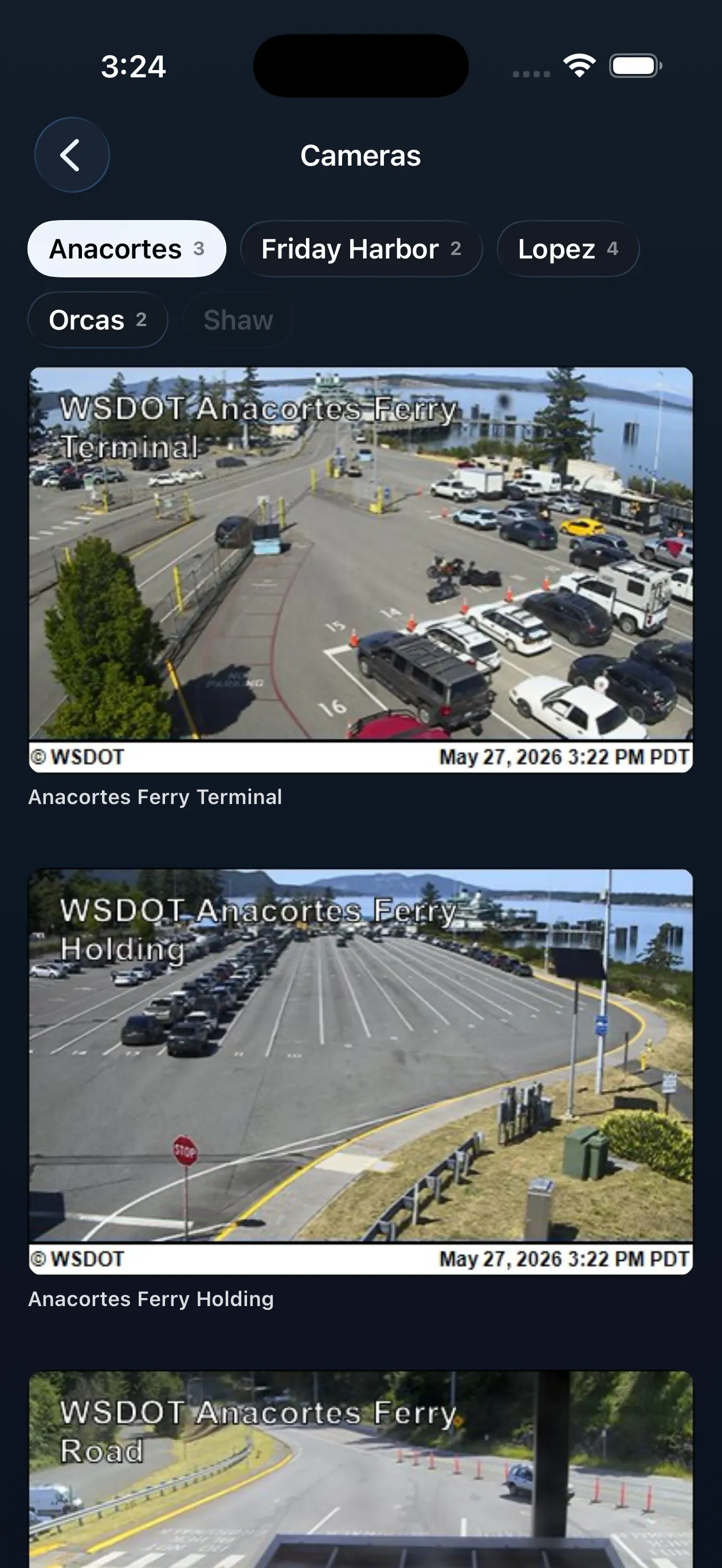 iPhone showing Cameras: WSDOT terminal camera feeds for Anacortes, with filter chips per island.