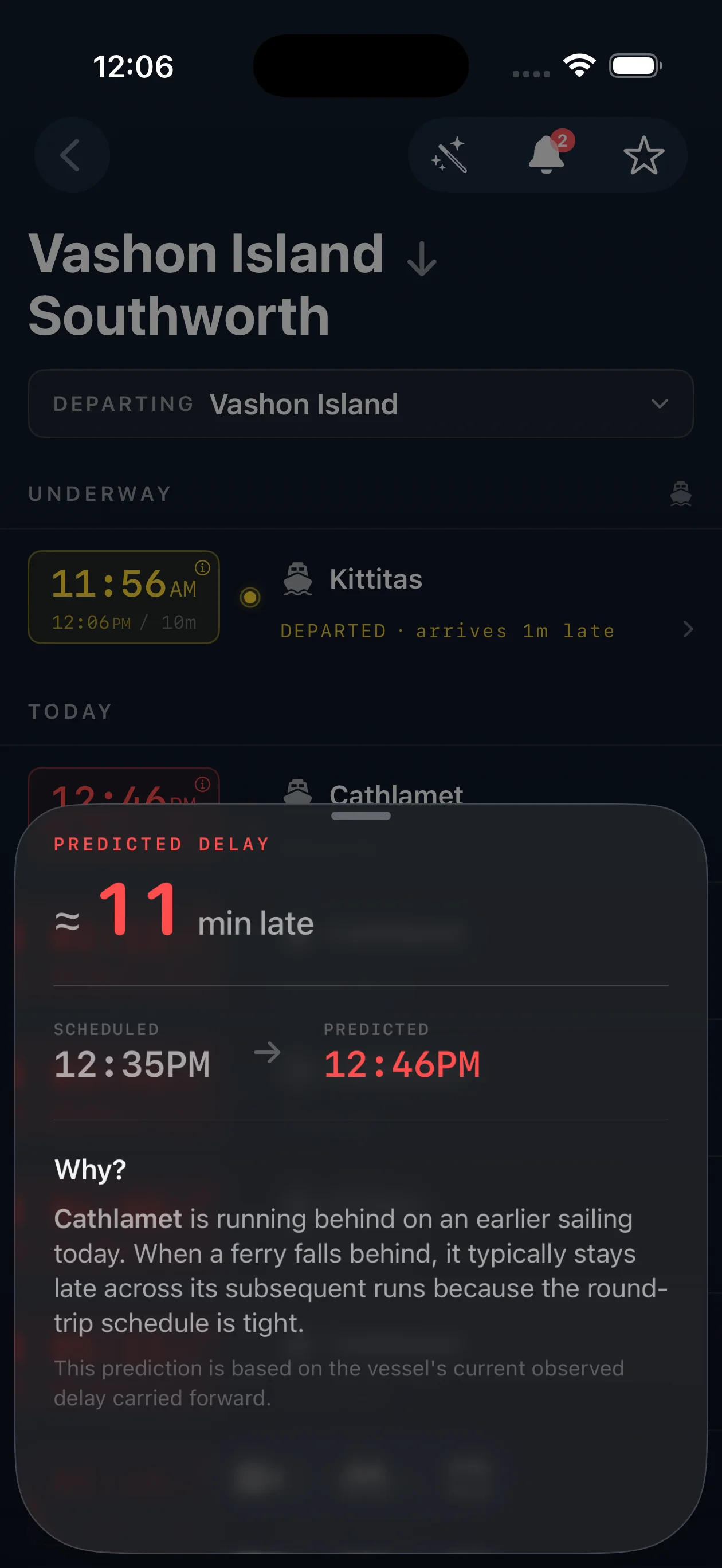 iPhone showing predicted delay: an 11-minute late prediction for the Cathlamet sailing from Vashon Island to Southworth, with a 'Why?' explainer noting the vessel is running behind on an earlier sailing today.