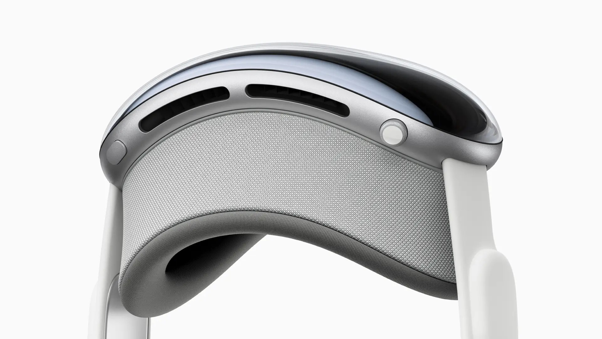 An image of the Vision Pro, slick marketing photo. It is pointing vertical (screen upwards) instead of its normal orientation, horizontal.